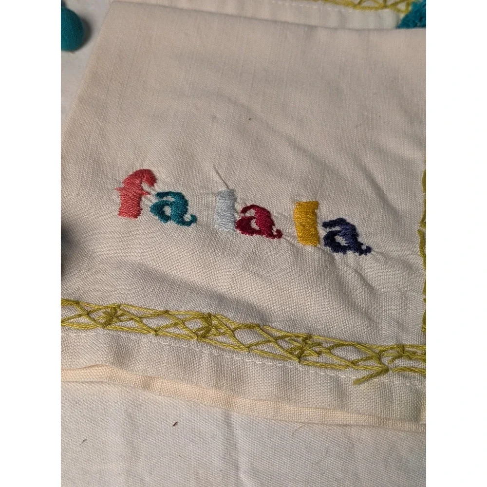Set of 4 Fa La La Embroidered Christmas Napkins Cream with Teal Pom Tassels